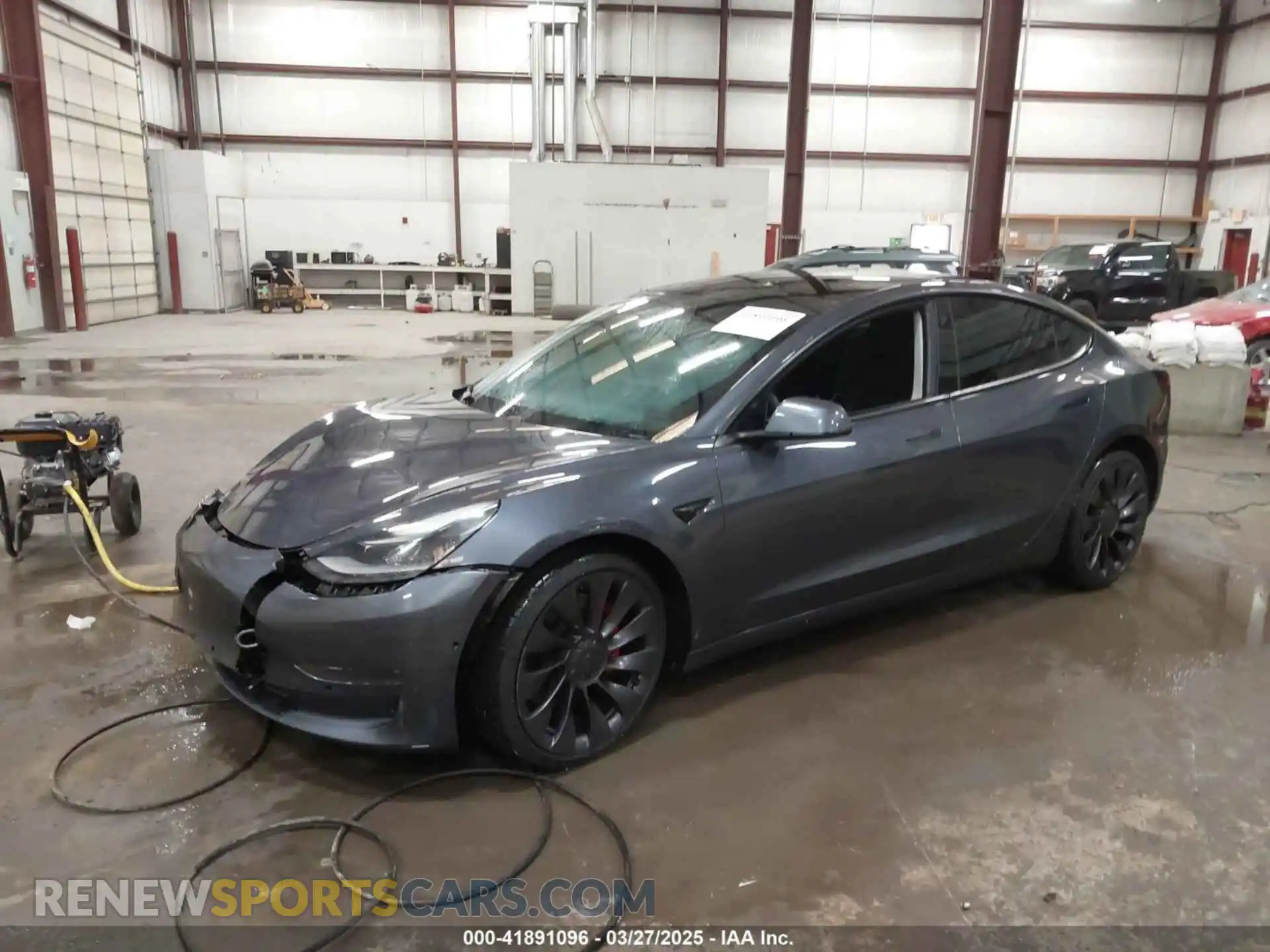 2 Photograph of a damaged car 5YJ3E1EC3MF044802 TESLA MODEL 3 2021