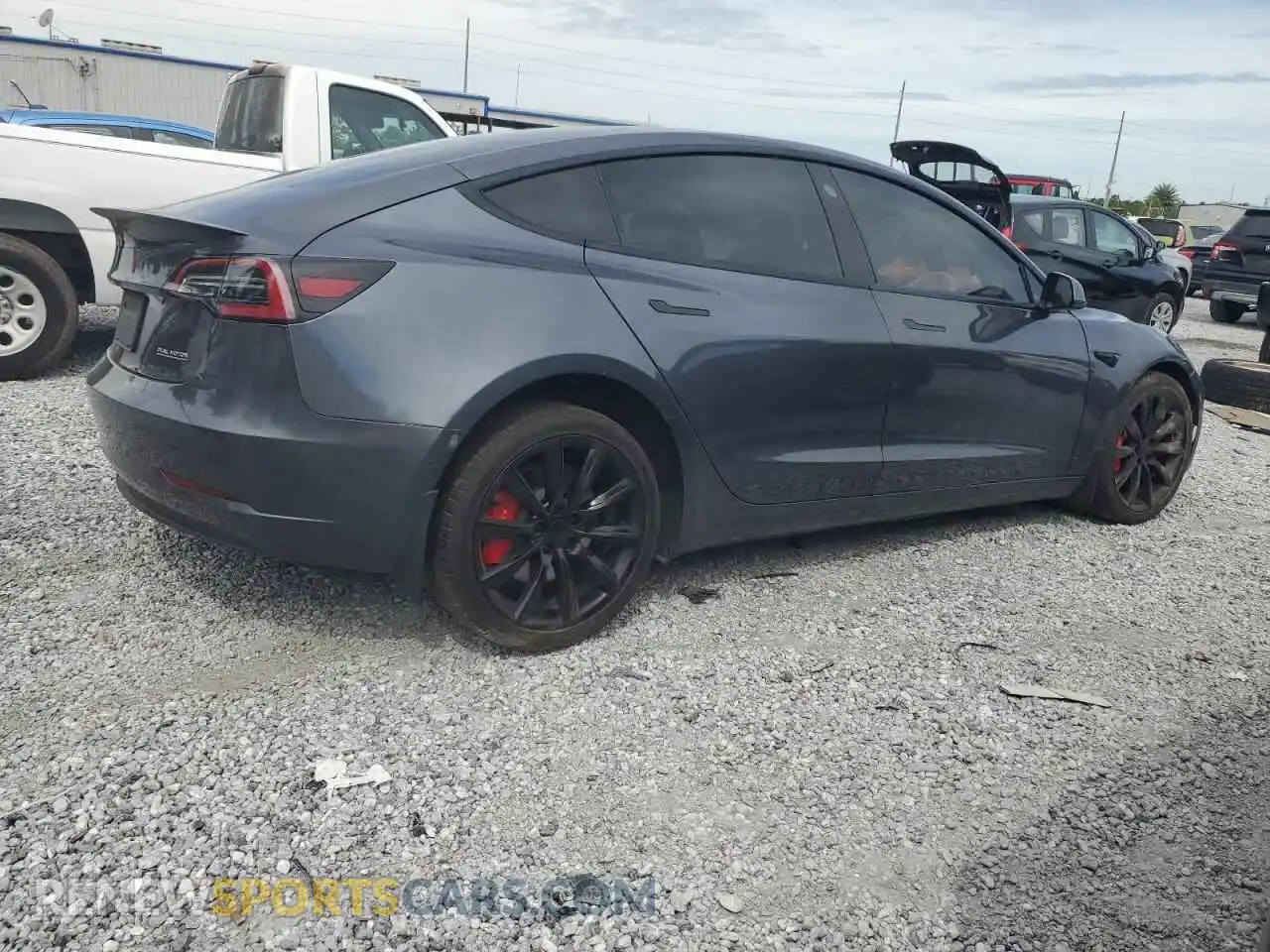 3 fotografías del automóvil dañado 5YJ3E1EC3MF914354 TESLA MODEL 3 2021