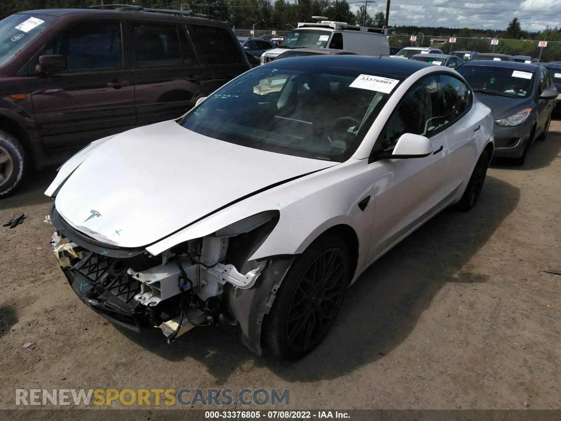 2 Photograph of a damaged car 5YJ3E1EC3MF996893 TESLA MODEL 3 2021