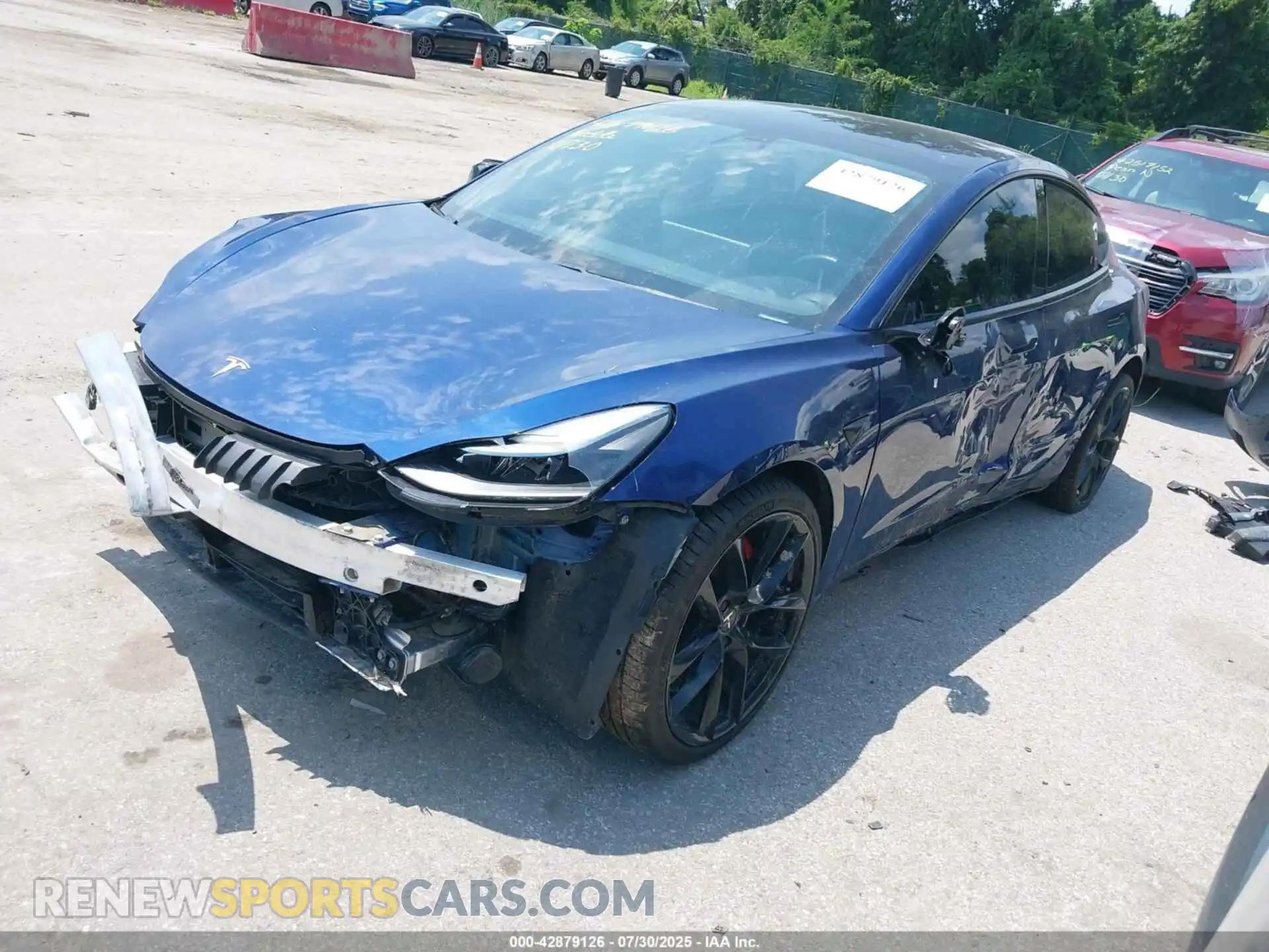 2 Photograph of a damaged car 5YJ3E1EC4MF054738 TESLA MODEL 3 2021