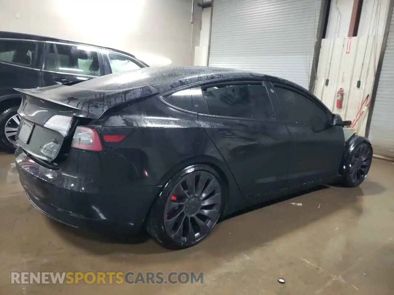 3 Photograph of a damaged car 5YJ3E1EC5MF064940 TESLA MODEL 3 2021