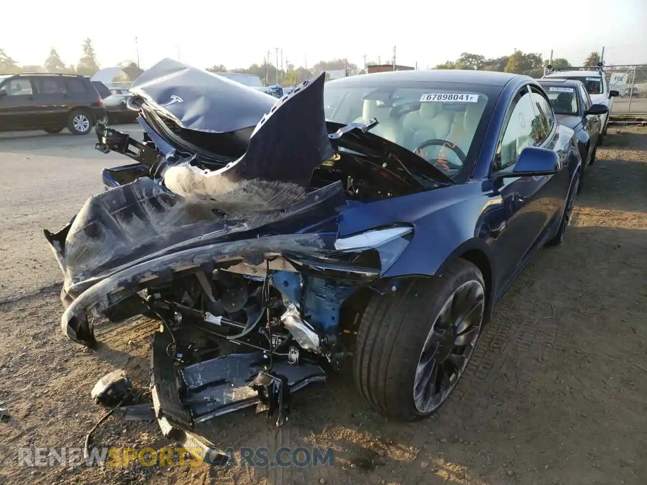 2 fotografías del automóvil dañado 5YJ3E1EC5MF076280 TESLA MODEL 3 2021
