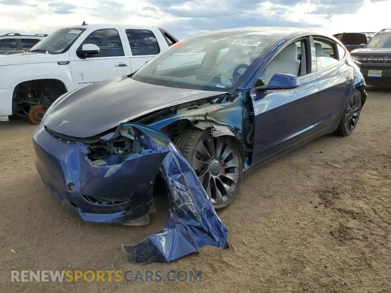 2 Photograph of a damaged car 5YJ3E1EC5MF856411 TESLA MODEL 3 2021