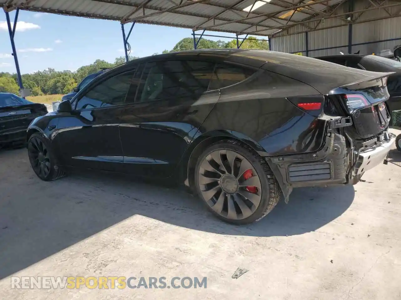 2 fotografías del automóvil dañado 5YJ3E1EC5MF991792 TESLA MODEL 3 2021