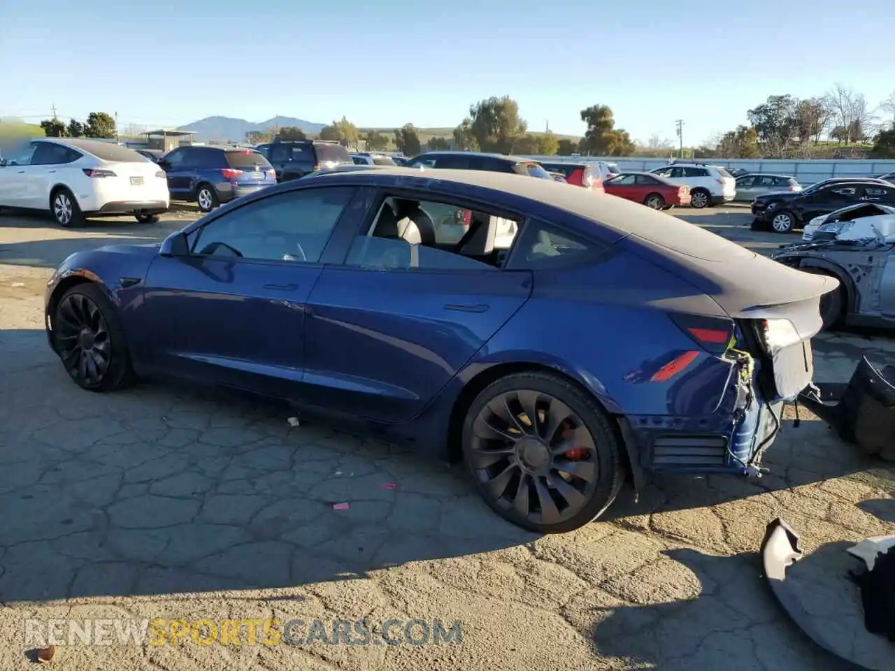 2 fotografías del automóvil dañado 5YJ3E1EC6MF077048 TESLA MODEL 3 2021