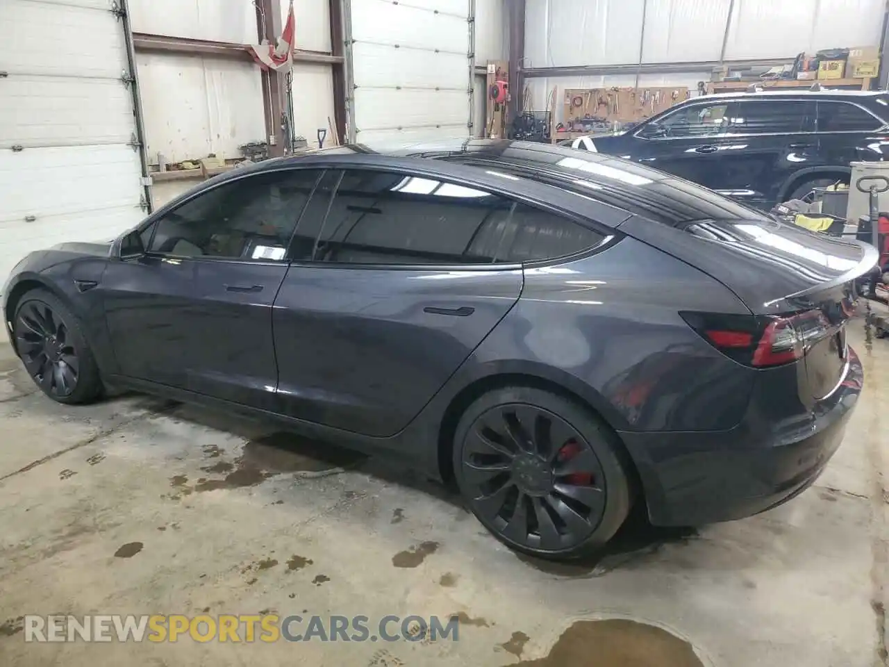 2 Photograph of a damaged car 5YJ3E1EC7MF063403 TESLA MODEL 3 2021