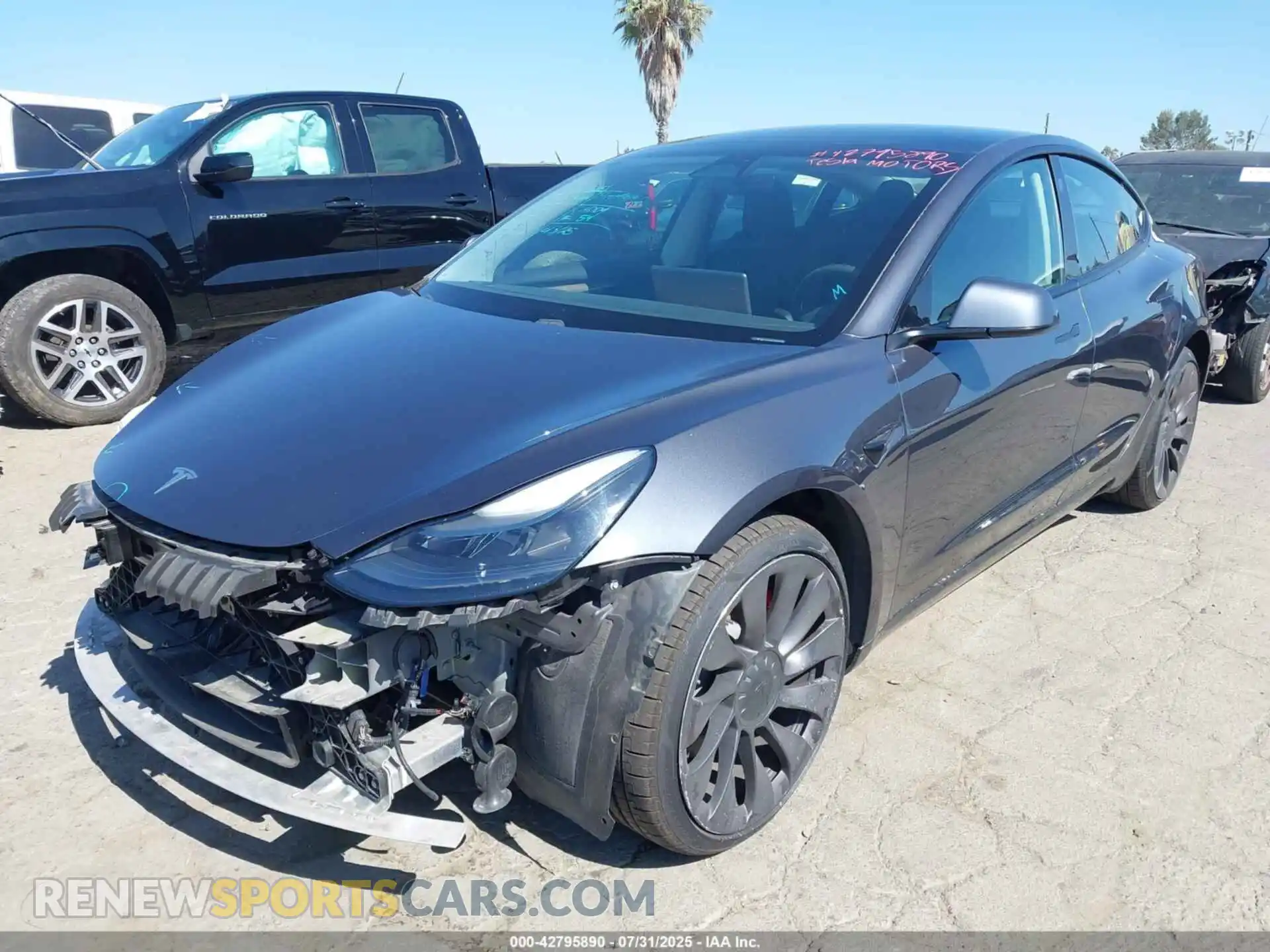 2 Photograph of a damaged car 5YJ3E1EC7MF073977 TESLA MODEL 3 2021