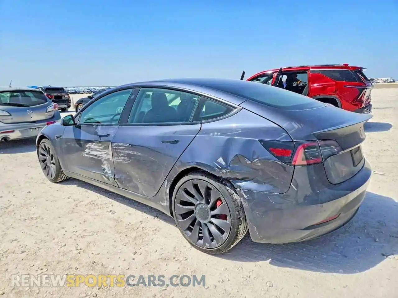 2 Photograph of a damaged car 5YJ3E1EC7MF990949 TESLA MODEL 3 2021