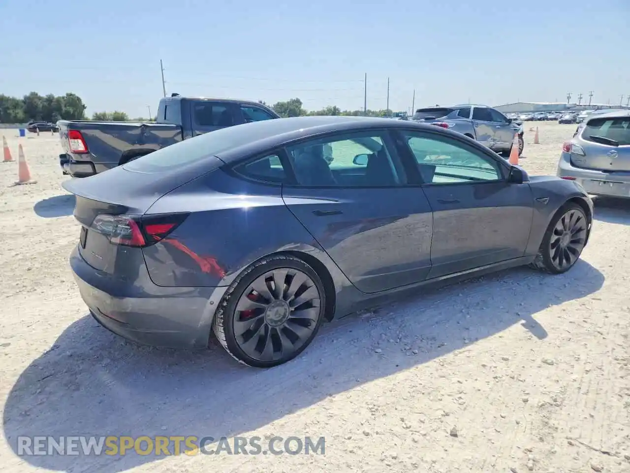 3 Photograph of a damaged car 5YJ3E1EC7MF990949 TESLA MODEL 3 2021
