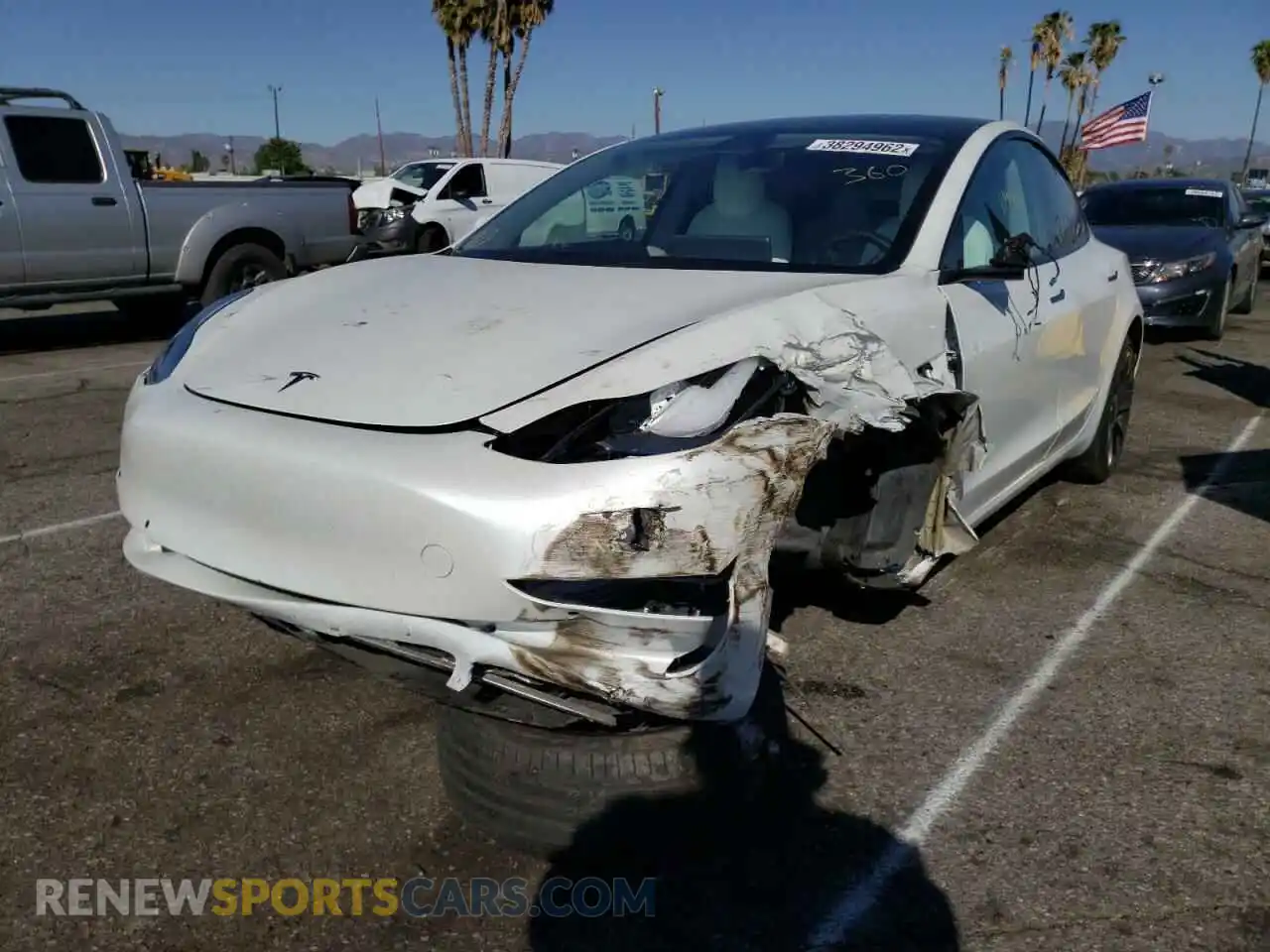 2 Photograph of a damaged car 5YJ3E1EC7MF995634 TESLA MODEL 3 2021