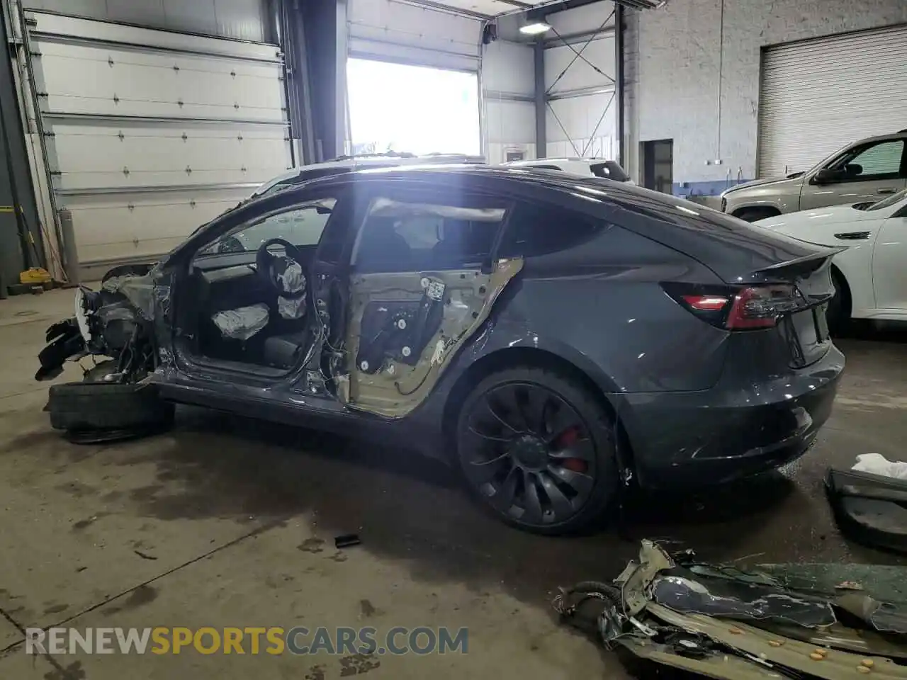 2 Photograph of a damaged car 5YJ3E1EC8MF860680 TESLA MODEL 3 2021