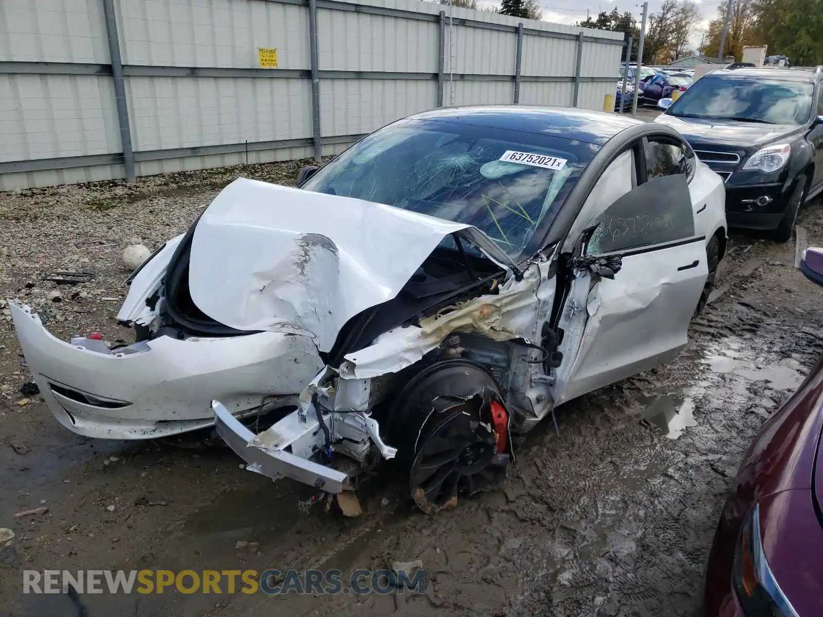2 Photograph of a damaged car 5YJ3E1EC8MF919291 TESLA MODEL 3 2021