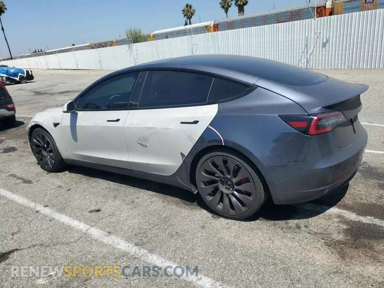 2 Photograph of a damaged car 5YJ3E1EC8MF990586 TESLA MODEL 3 2021