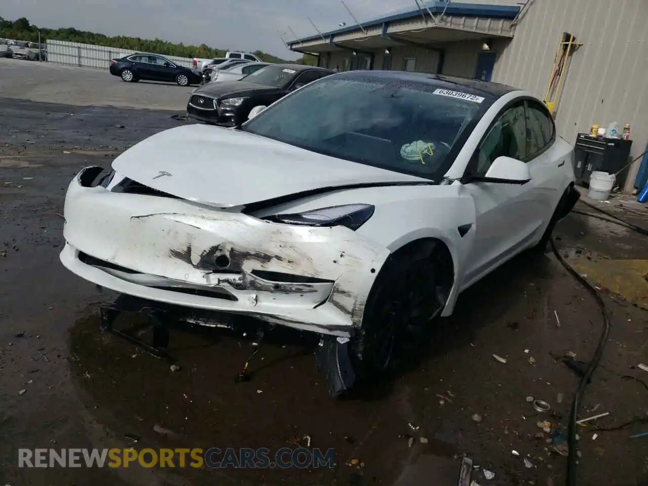 2 Photograph of a damaged car 5YJ3E1EC9MF050023 TESLA MODEL 3 2021