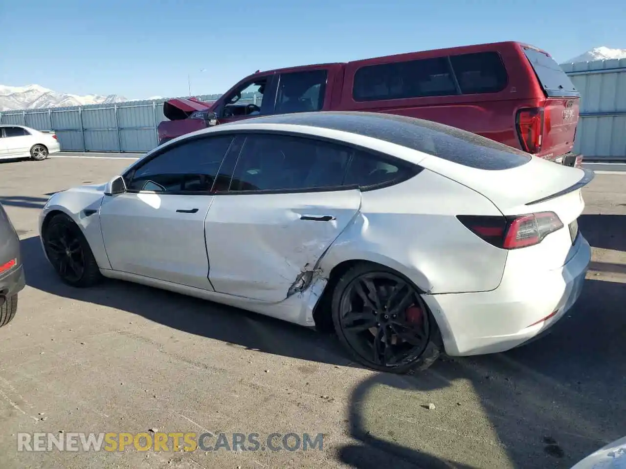 2 Photograph of a damaged car 5YJ3E1EC9MF063418 TESLA MODEL 3 2021