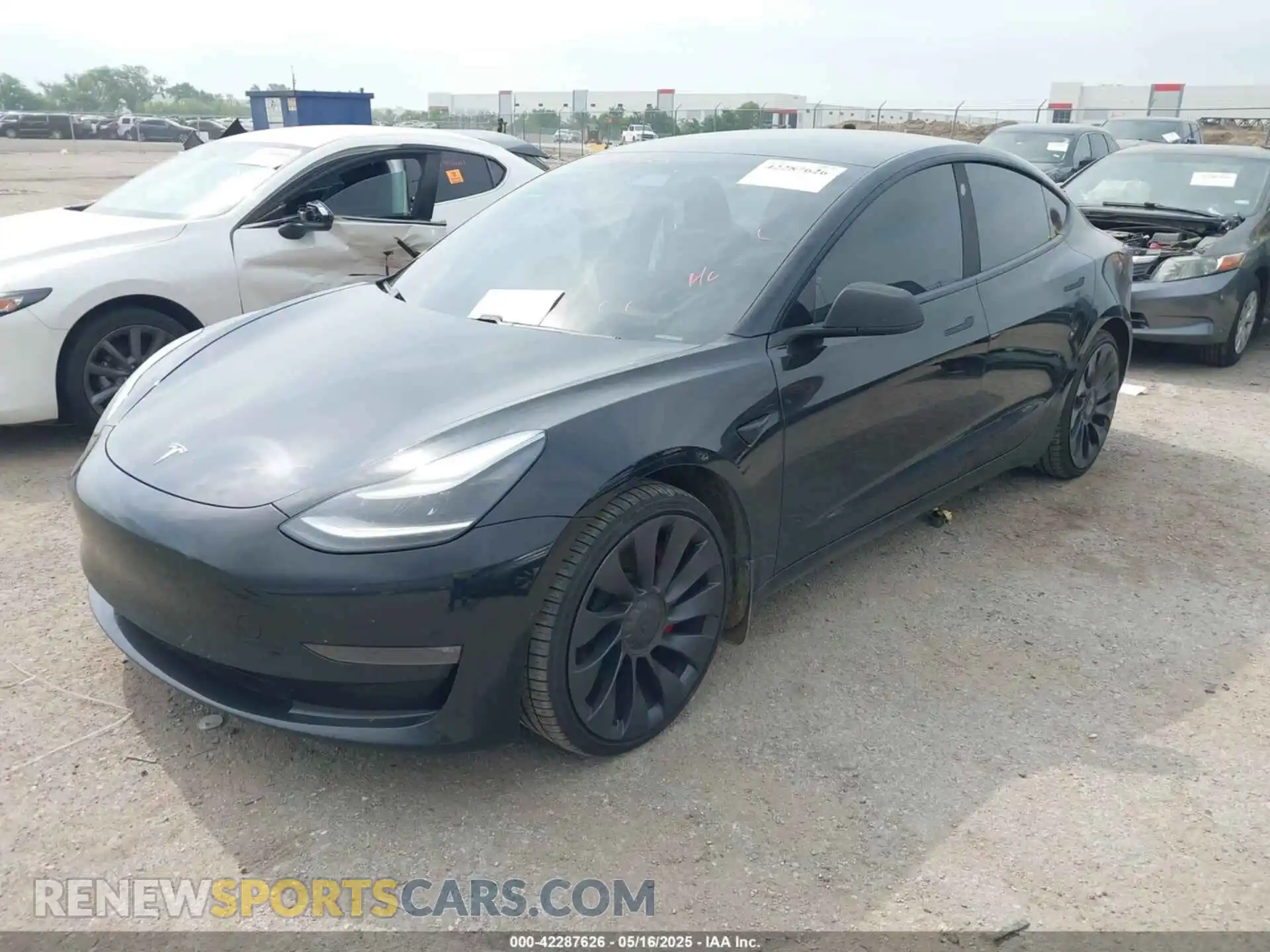 2 Photograph of a damaged car 5YJ3E1ECXMF056512 TESLA MODEL 3 2021
