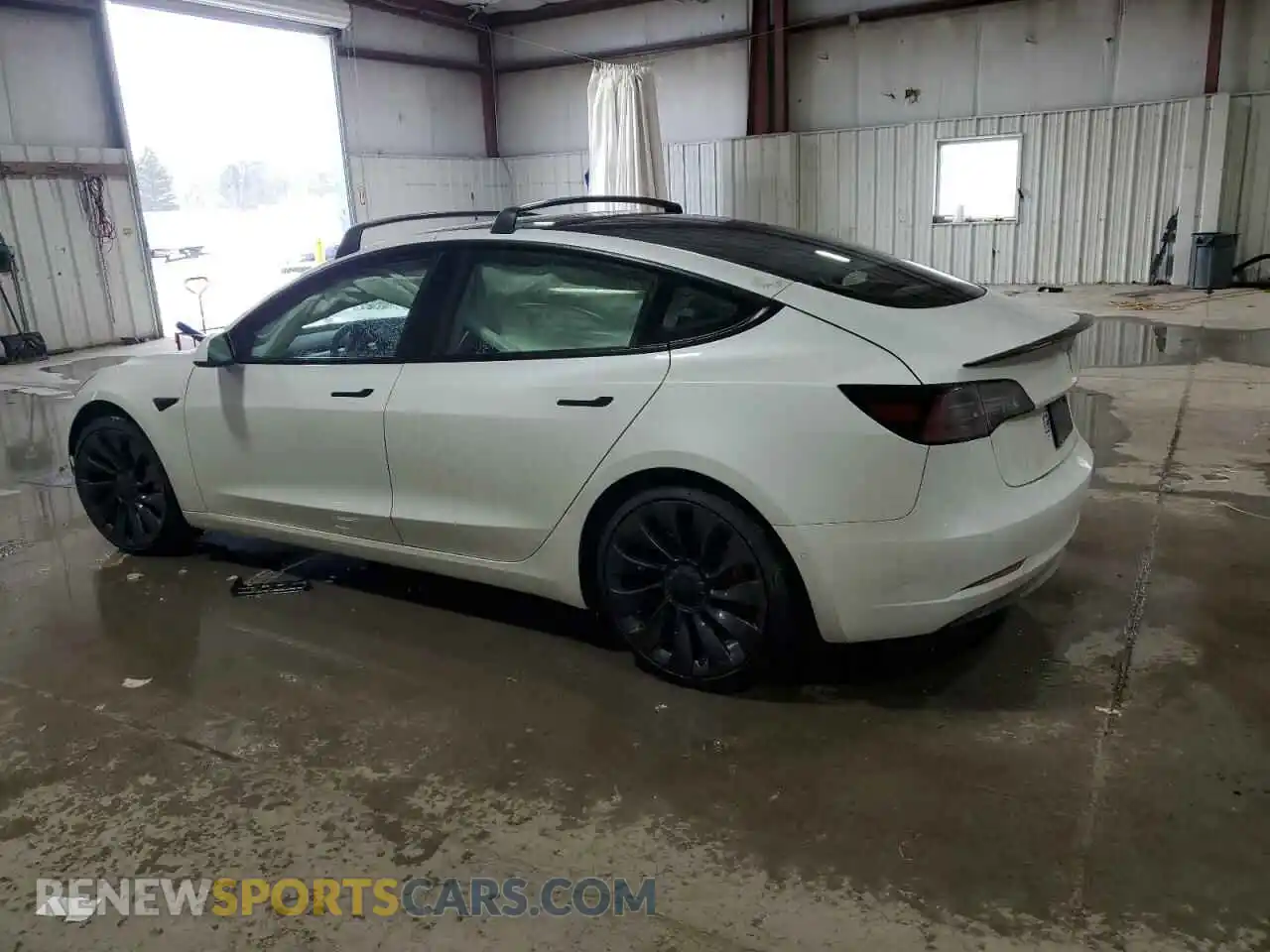 2 Photograph of a damaged car 5YJ3E1ECXMF976124 TESLA MODEL 3 2021