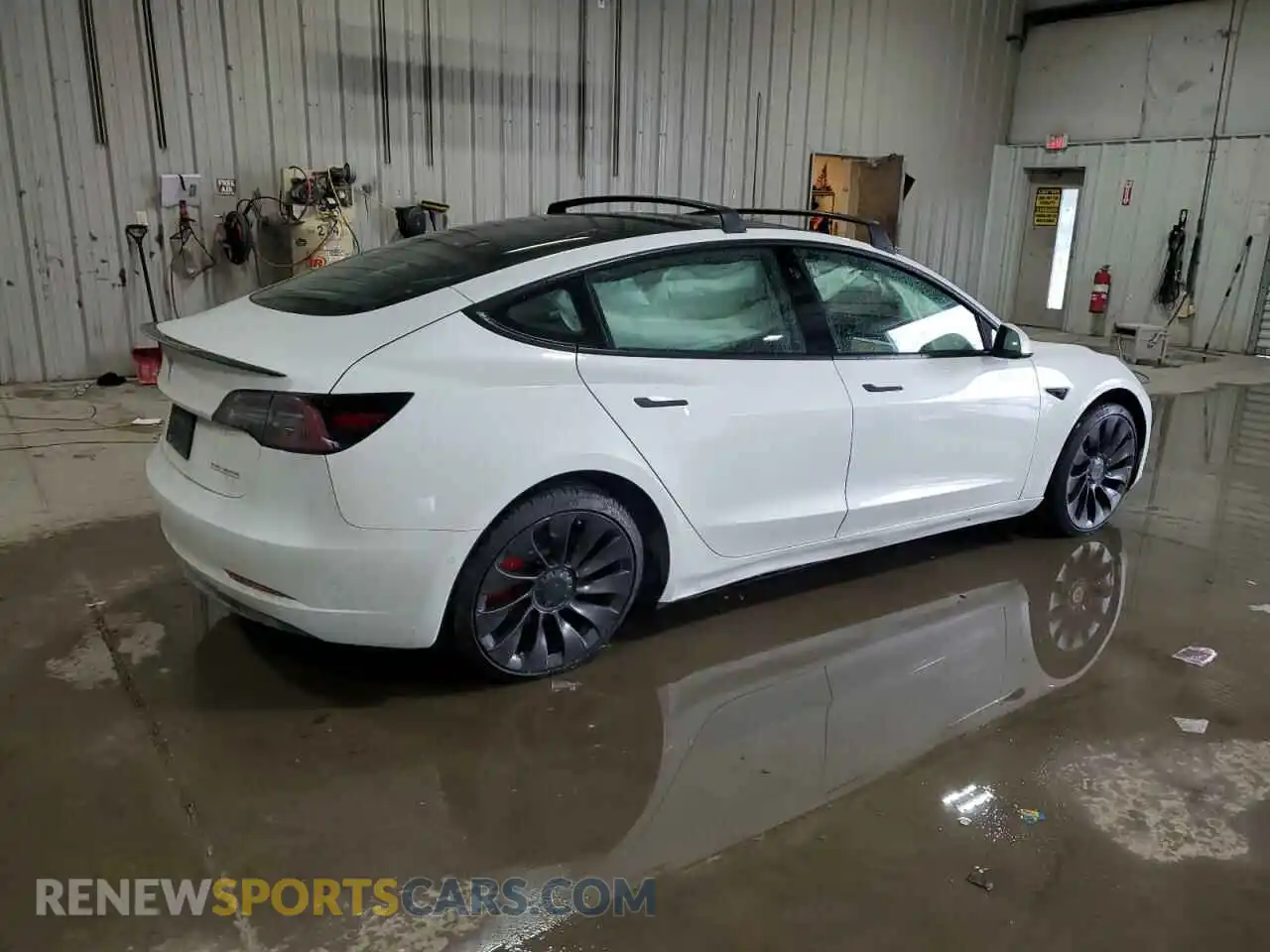 3 Photograph of a damaged car 5YJ3E1ECXMF976124 TESLA MODEL 3 2021