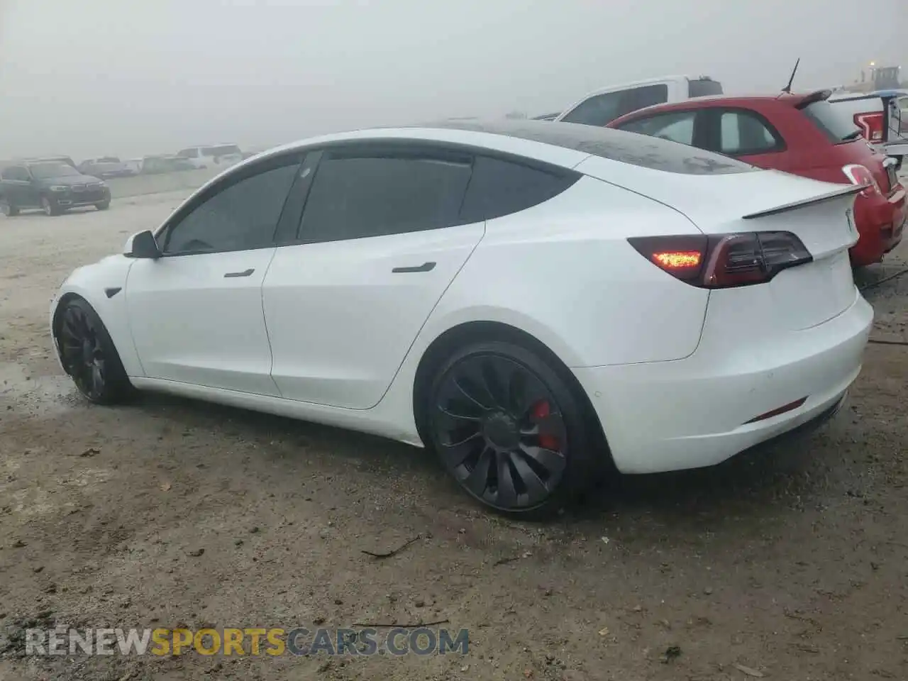 2 Photograph of a damaged car 5YJ3E1ECXMF984417 TESLA MODEL 3 2021