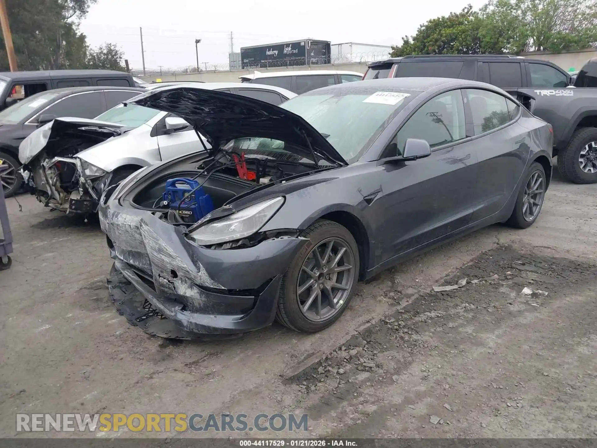 2 Photograph of a damaged car 5YJ3E1EA0NF103174 TESLA MODEL 3 2022