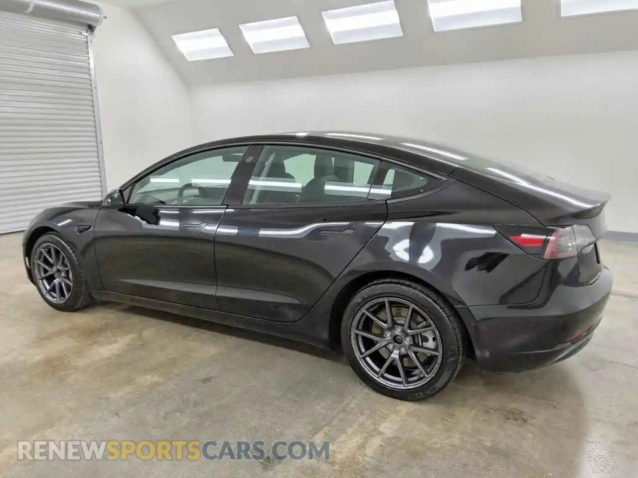 2 Photograph of a damaged car 5YJ3E1EA0NF186265 TESLA MODEL 3 2022