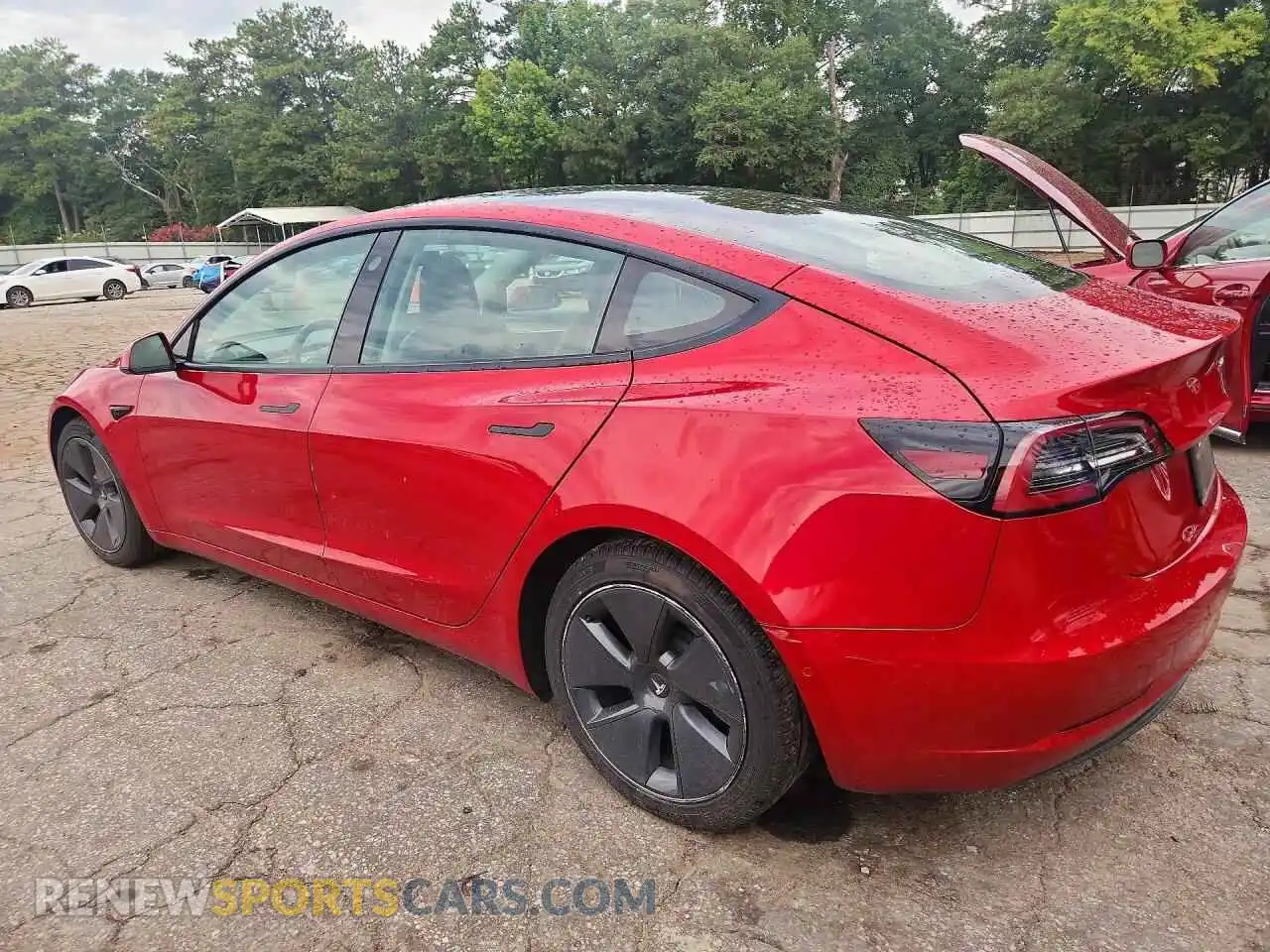 2 Photograph of a damaged car 5YJ3E1EA0NF187173 TESLA MODEL 3 2022