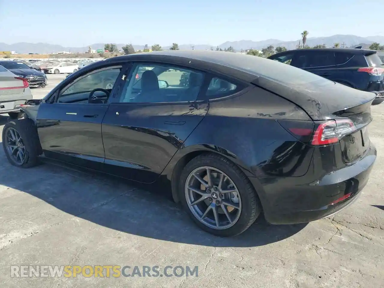 2 Photograph of a damaged car 5YJ3E1EA0NF288049 TESLA MODEL 3 2022