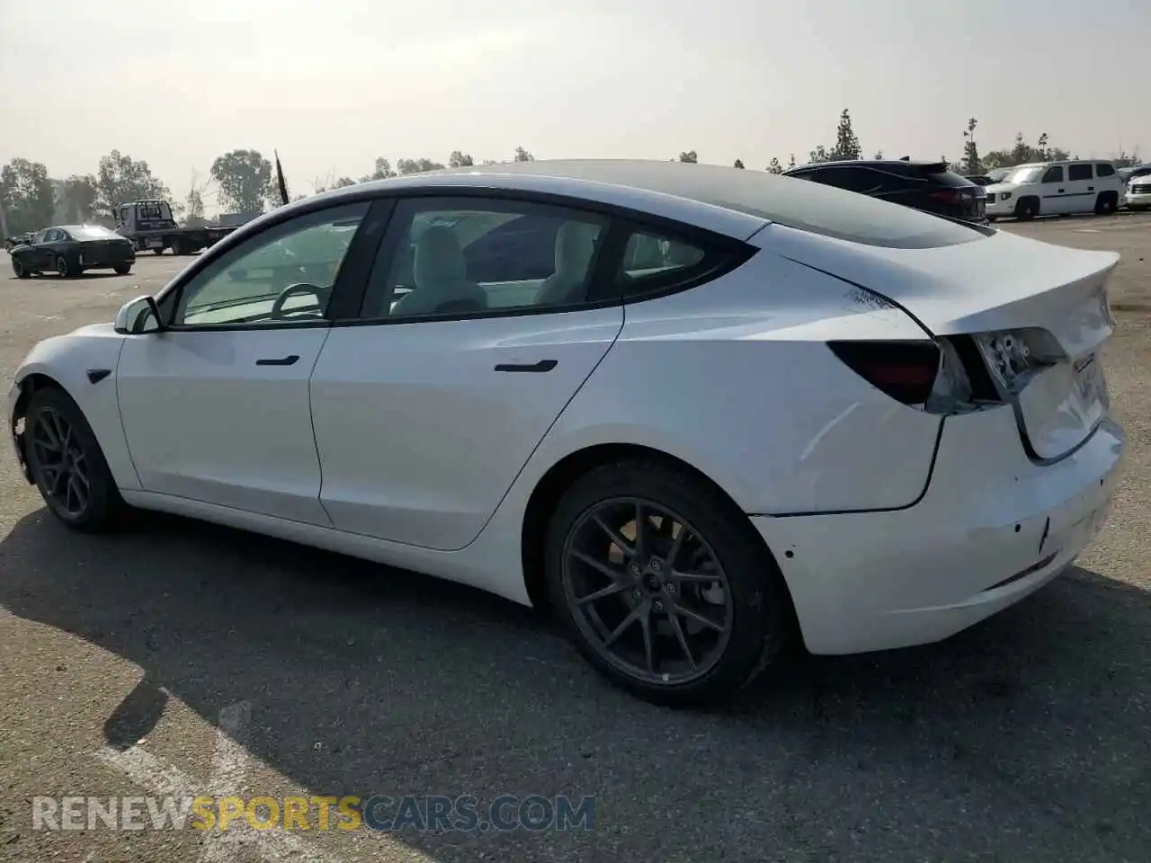 2 fotografías del automóvil dañado 5YJ3E1EA0NF360111 TESLA MODEL 3 2022