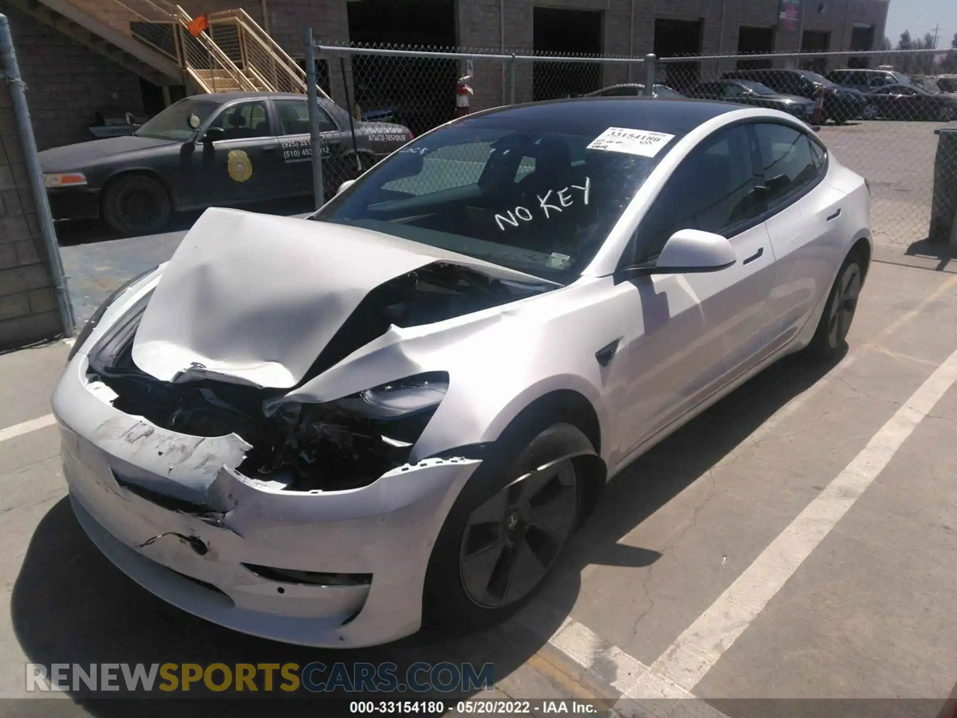 2 fotografías del automóvil dañado 5YJ3E1EA1NF102891 TESLA MODEL 3 2022