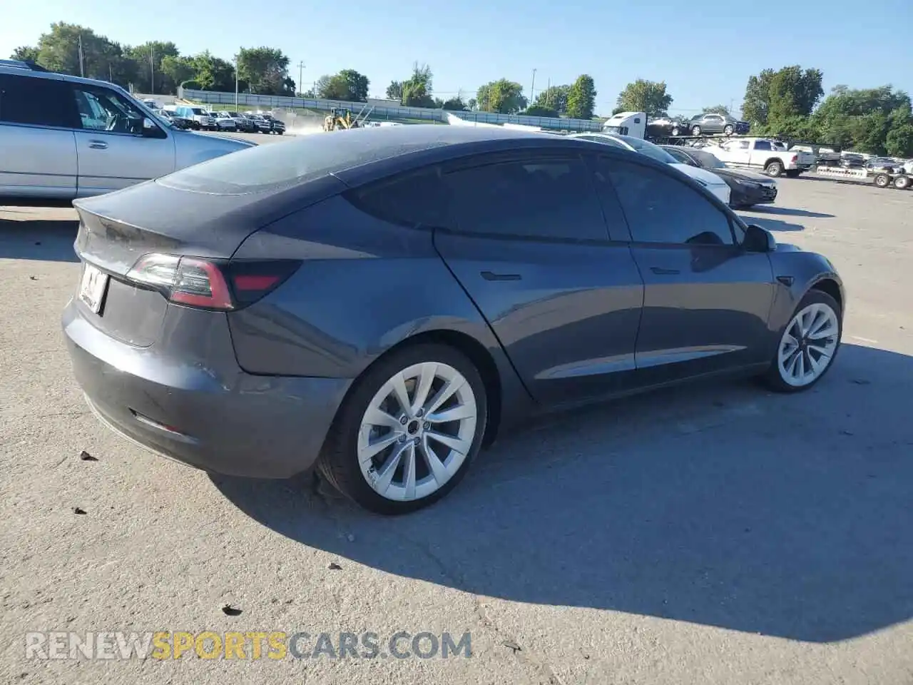 3 Photograph of a damaged car 5YJ3E1EA1NF144090 TESLA MODEL 3 2022