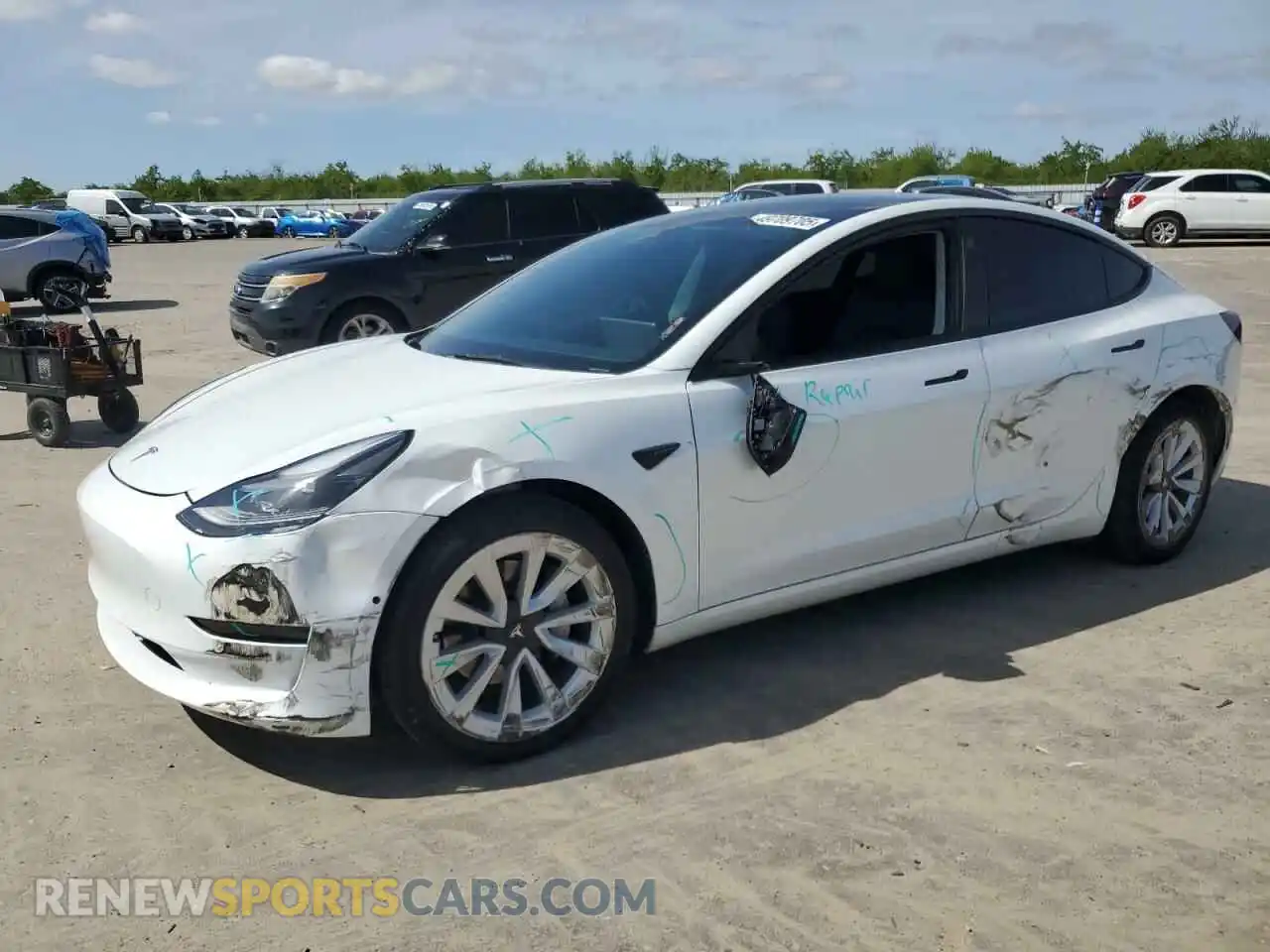 1 Photograph of a damaged car 5YJ3E1EA1NF303660 TESLA MODEL 3 2022