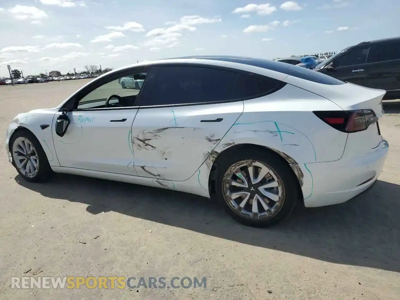 2 Photograph of a damaged car 5YJ3E1EA1NF303660 TESLA MODEL 3 2022