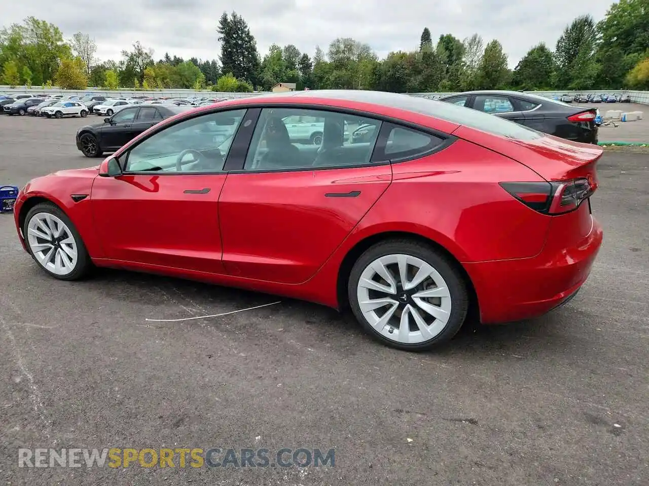 2 Photograph of a damaged car 5YJ3E1EA1NF303822 TESLA MODEL 3 2022