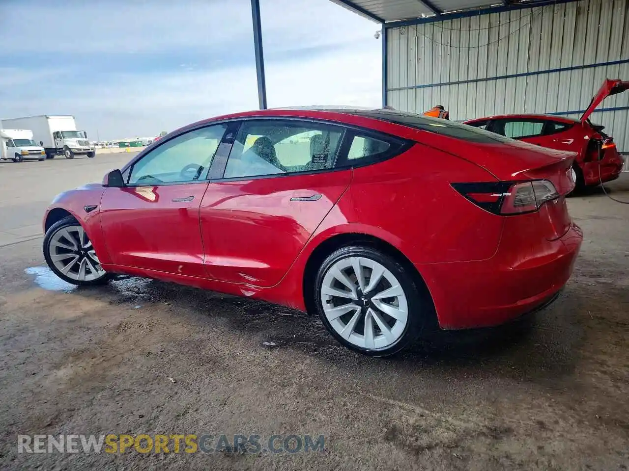 2 Photograph of a damaged car 5YJ3E1EA1NF303982 TESLA MODEL 3 2022