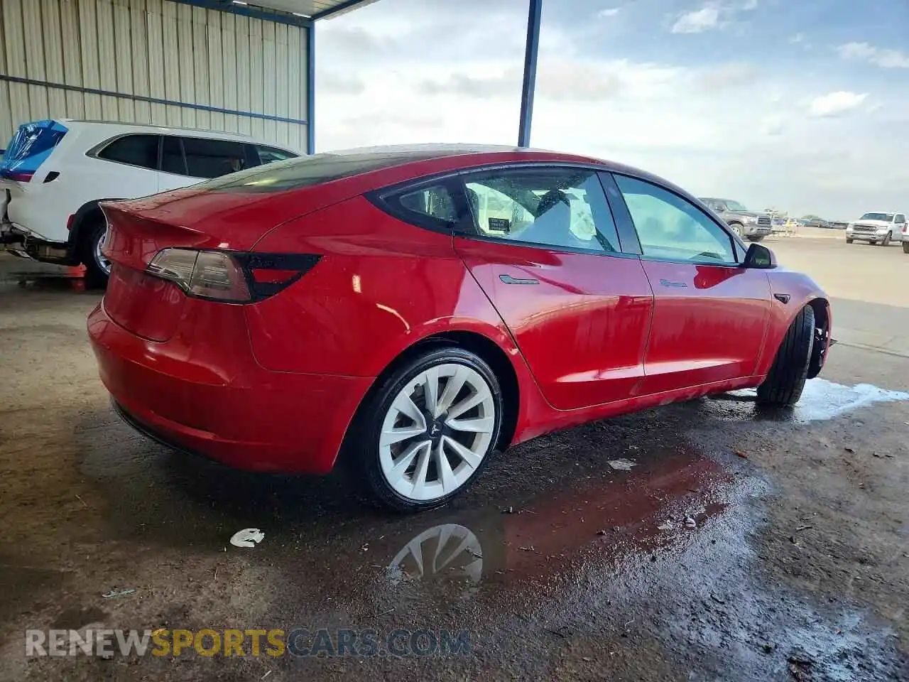 3 Photograph of a damaged car 5YJ3E1EA1NF303982 TESLA MODEL 3 2022