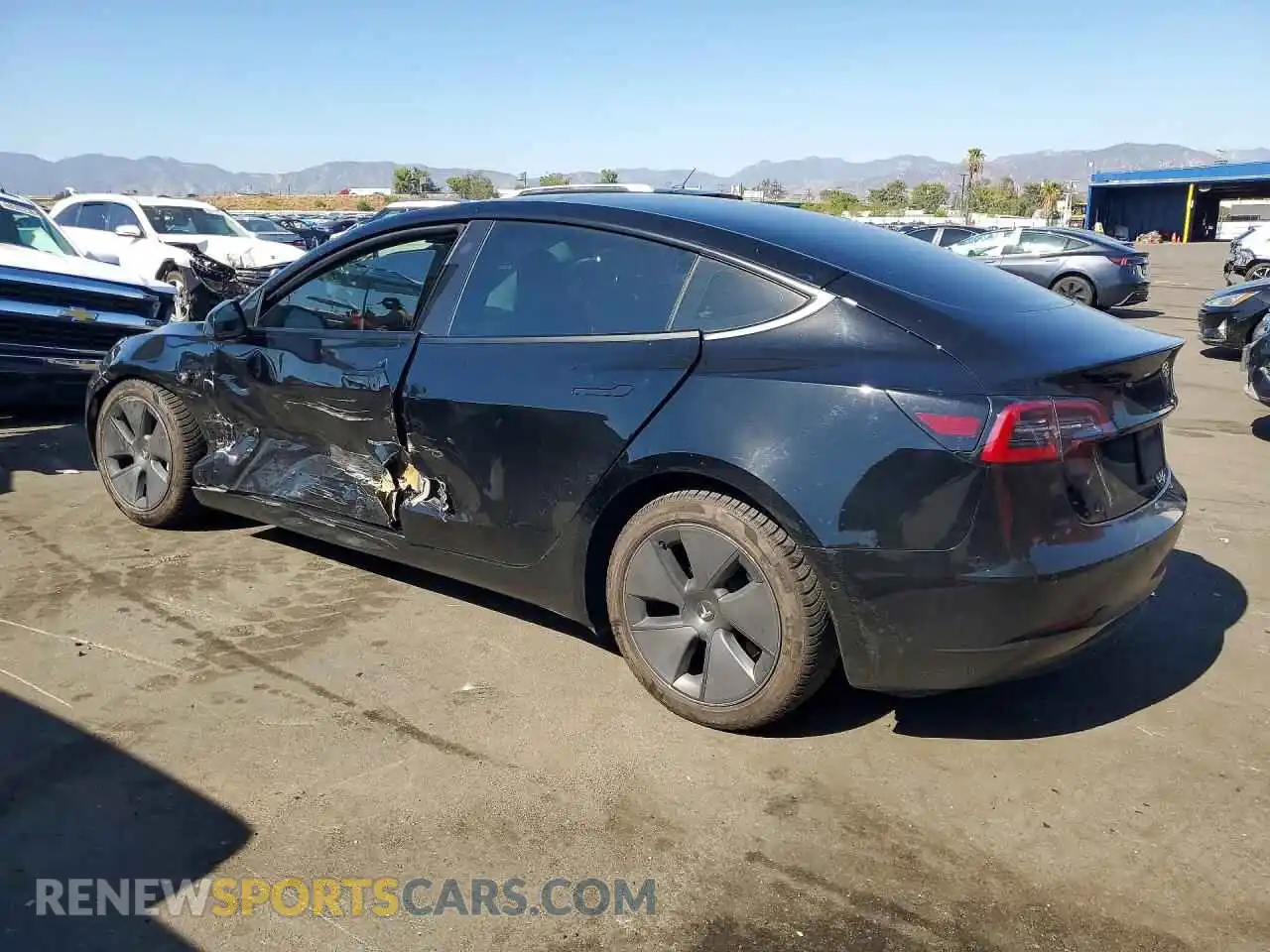 2 Photograph of a damaged car 5YJ3E1EA1NF353717 TESLA MODEL 3 2022