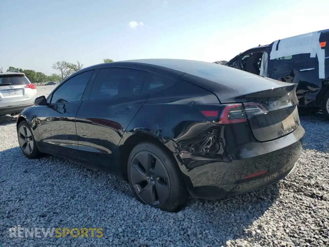 2 Photograph of a damaged car 5YJ3E1EA1NF374390 TESLA MODEL 3 2022