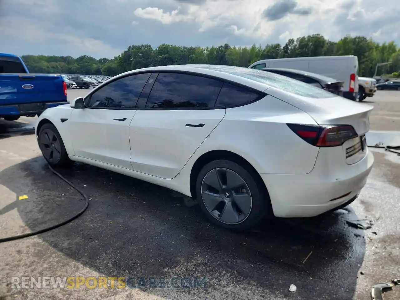 2 fotografías del automóvil dañado 5YJ3E1EA2NF148519 TESLA MODEL 3 2022