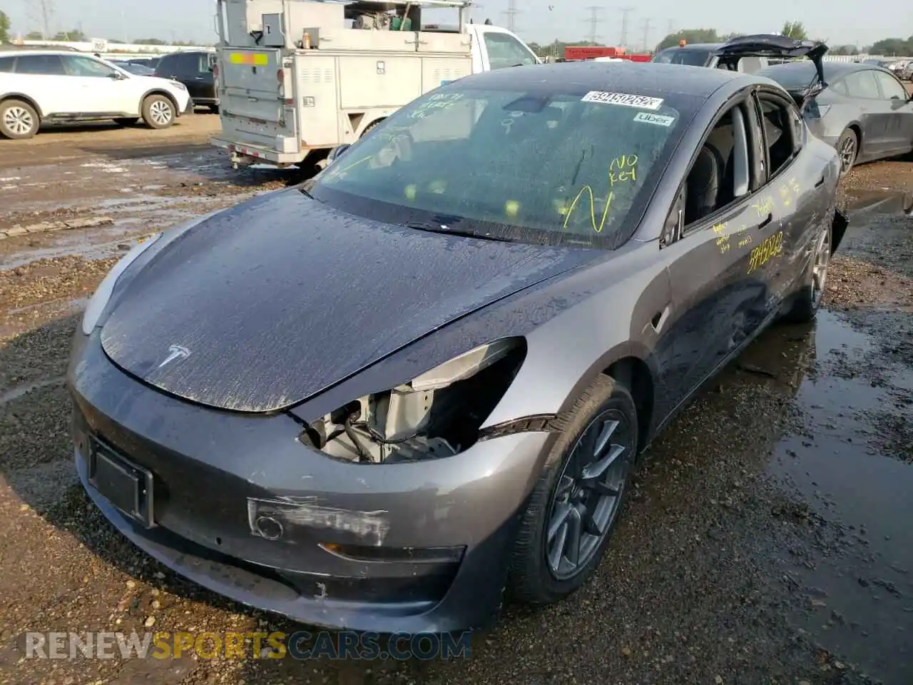 2 fotografías del automóvil dañado 5YJ3E1EA2NF286156 TESLA MODEL 3 2022
