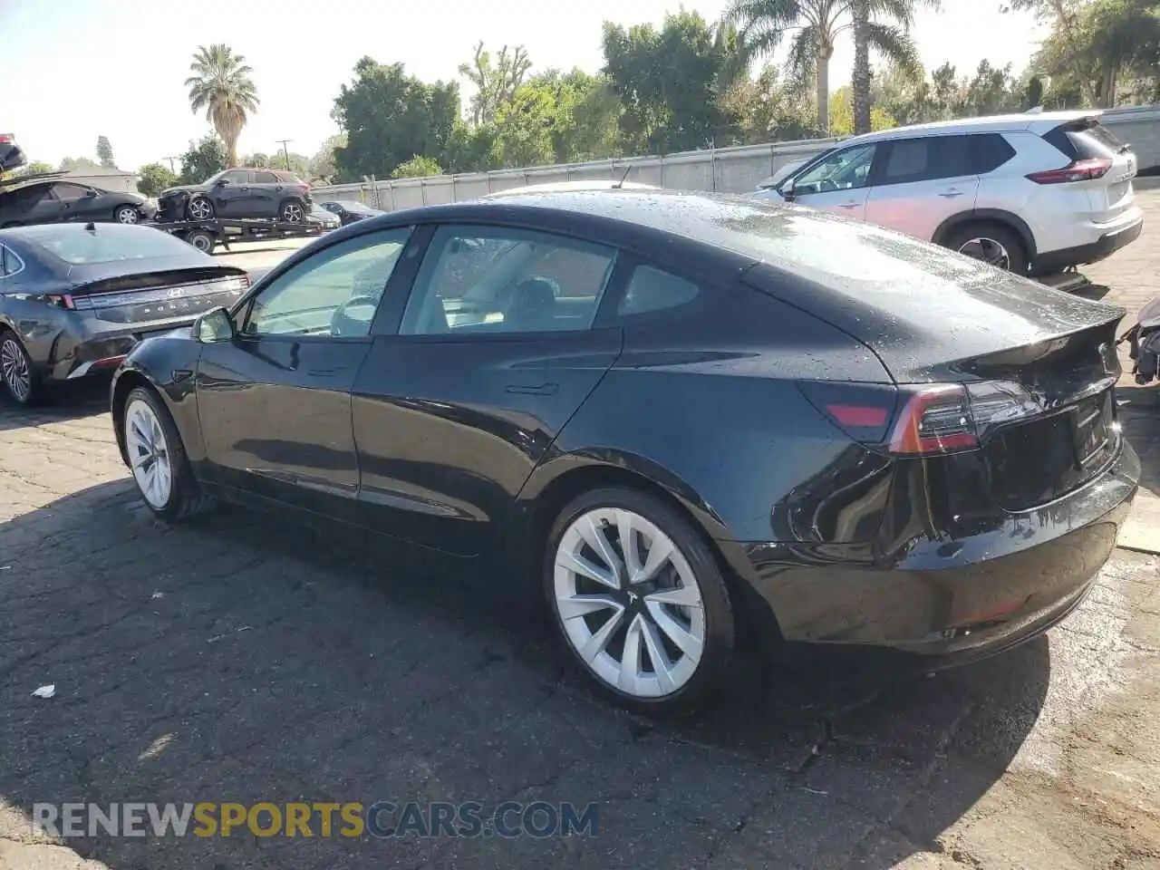 2 fotografías del automóvil dañado 5YJ3E1EA2NF287162 TESLA MODEL 3 2022