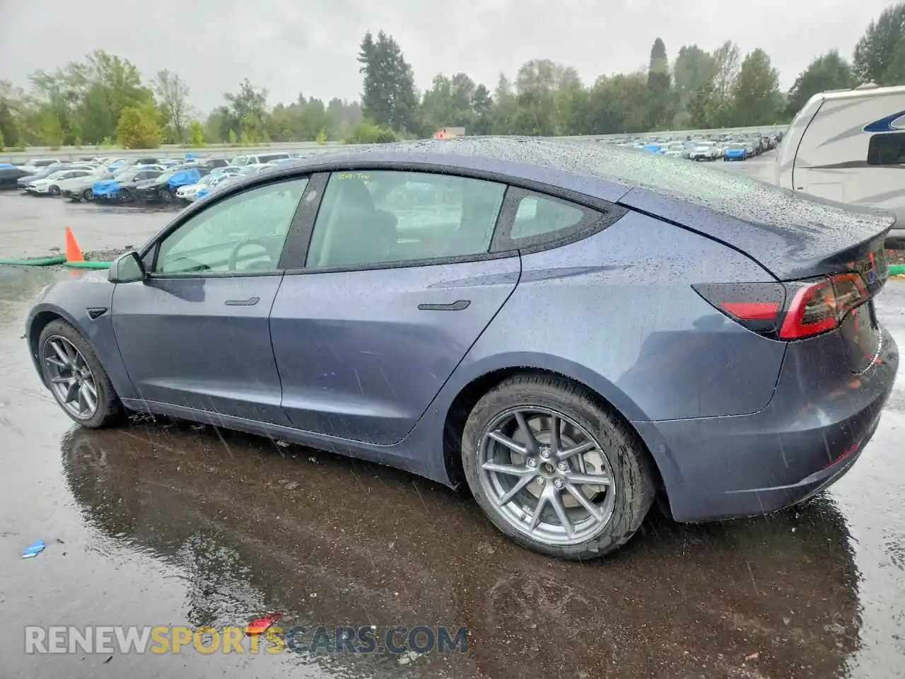 2 fotografías del automóvil dañado 5YJ3E1EA2NF290434 TESLA MODEL 3 2022
