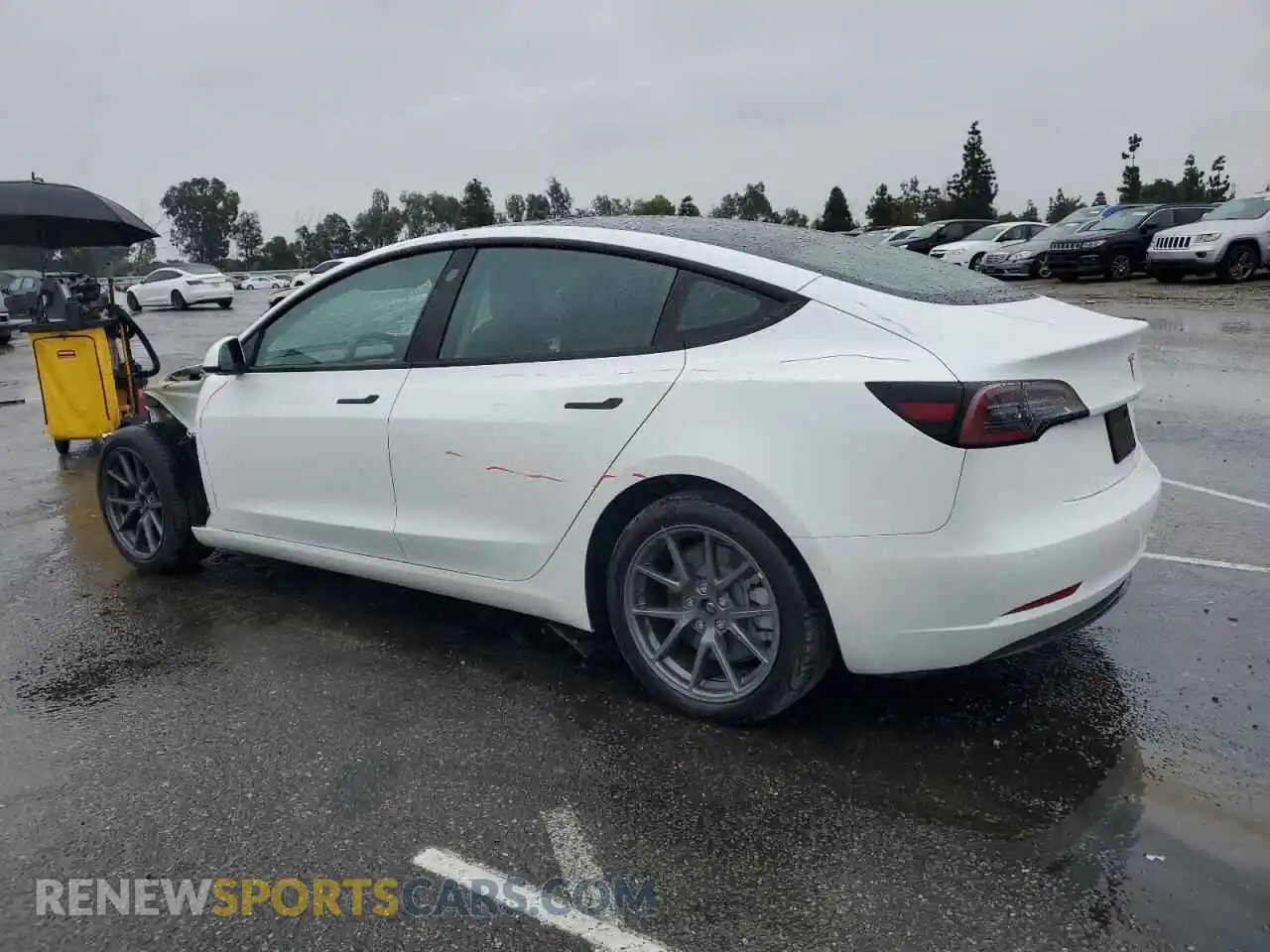 2 Photograph of a damaged car 5YJ3E1EA2NF306874 TESLA MODEL 3 2022
