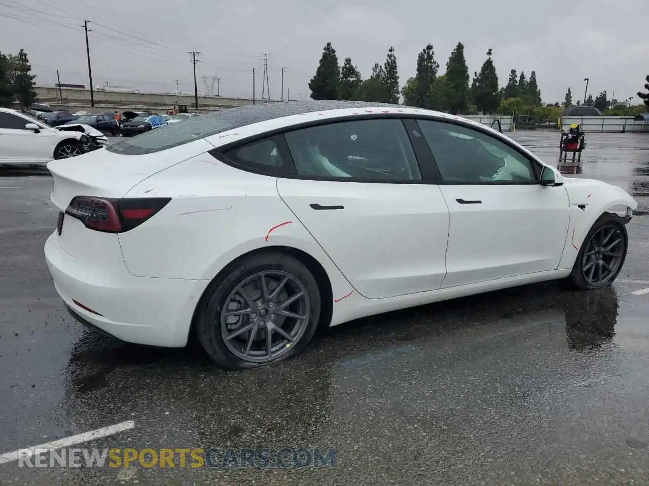 3 Photograph of a damaged car 5YJ3E1EA2NF306874 TESLA MODEL 3 2022