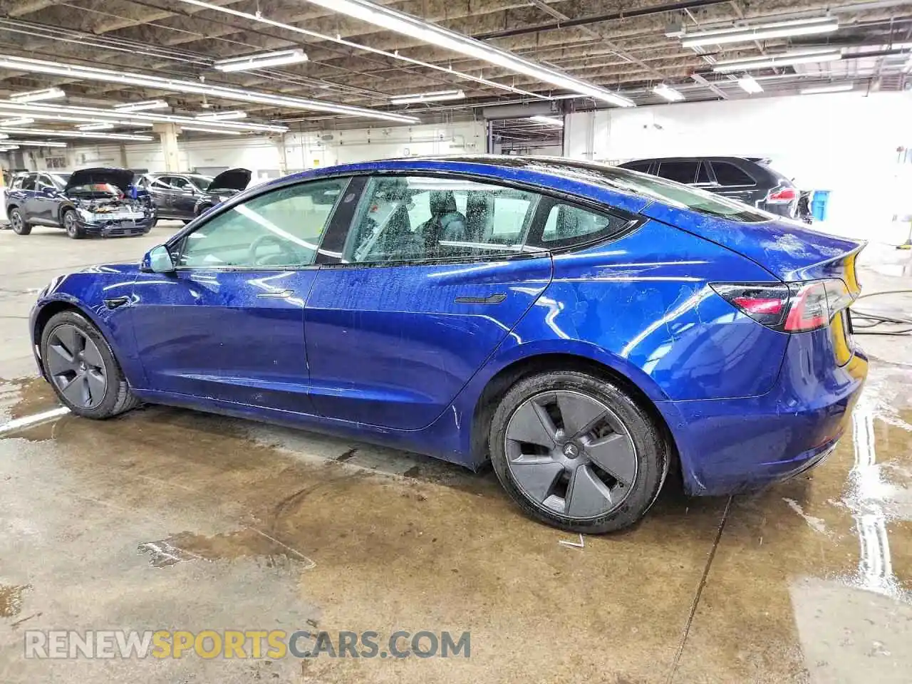 2 Photograph of a damaged car 5YJ3E1EA2NF371269 TESLA MODEL 3 2022