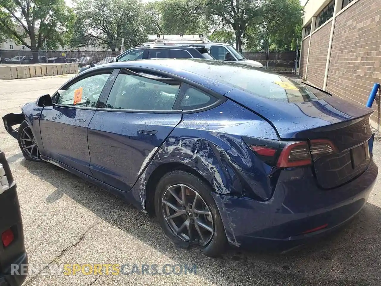 2 Photograph of a damaged car 5YJ3E1EA2NF371837 TESLA MODEL 3 2022