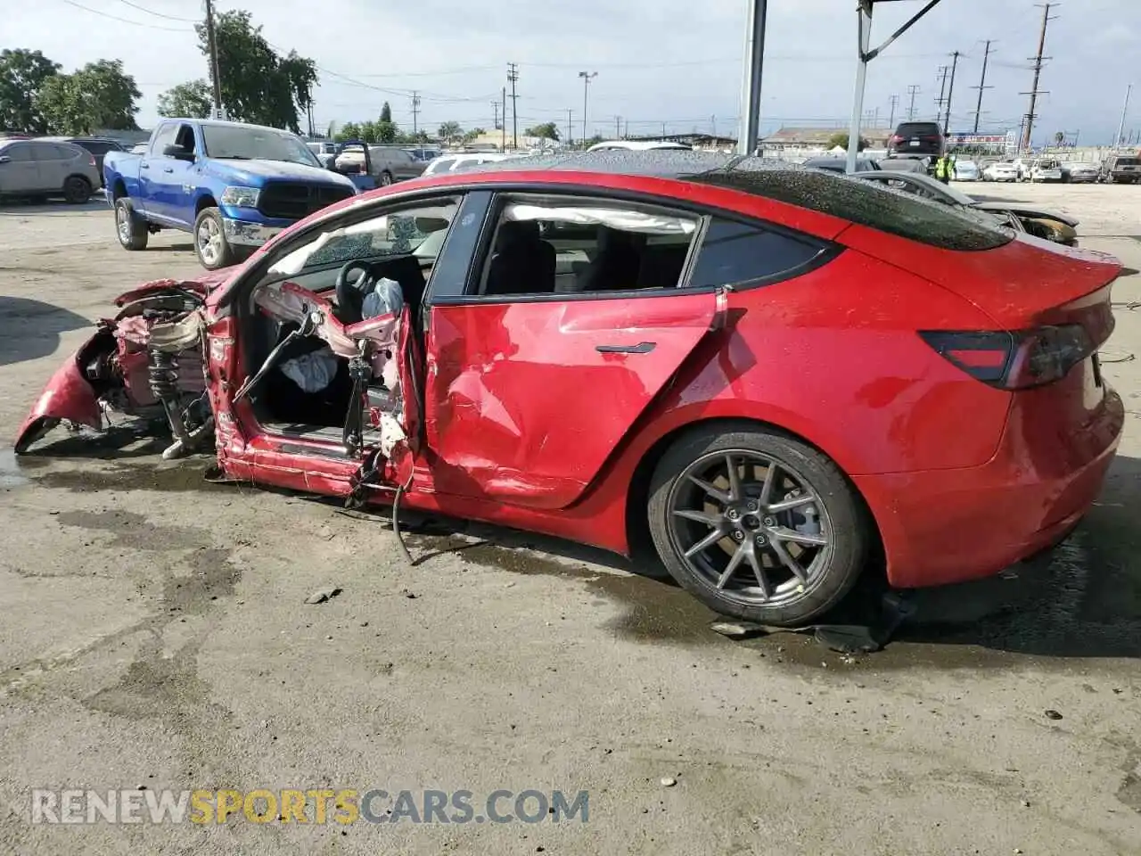 2 fotografías del automóvil dañado 5YJ3E1EA3NF131499 TESLA MODEL 3 2022