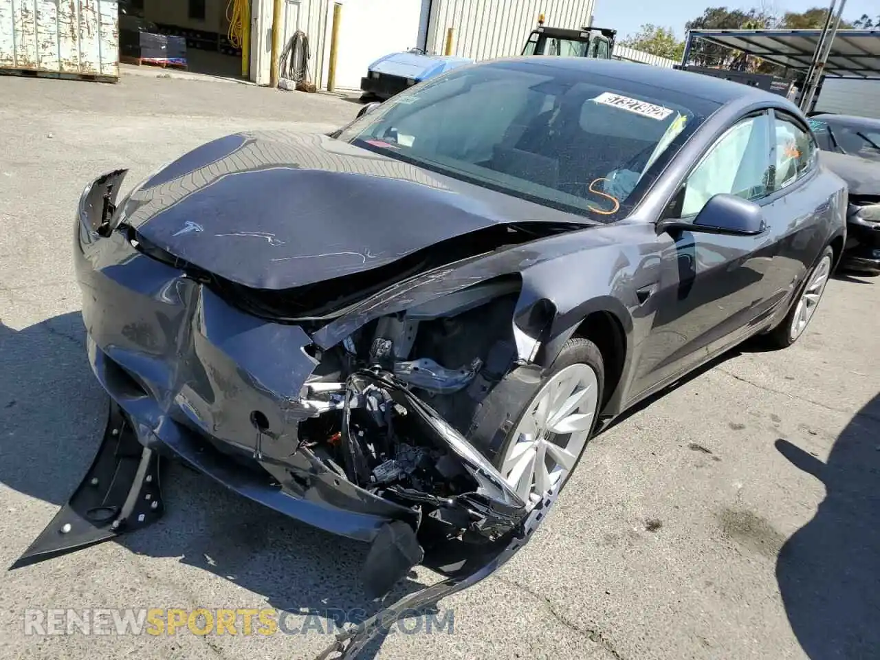 2 fotografías del automóvil dañado 5YJ3E1EA3NF144348 TESLA MODEL 3 2022