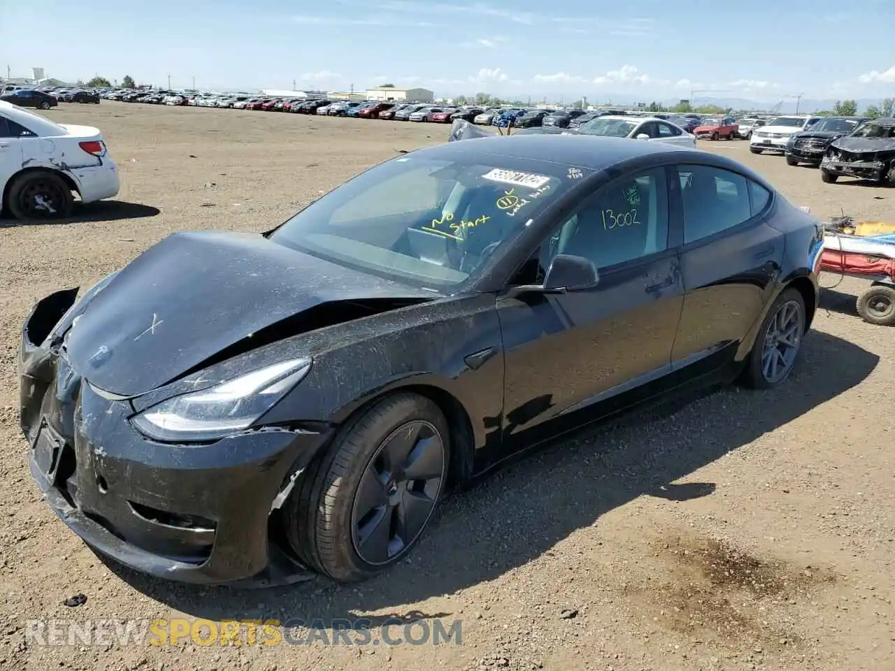 2 Photograph of a damaged car 5YJ3E1EA3NF185787 TESLA MODEL 3 2022