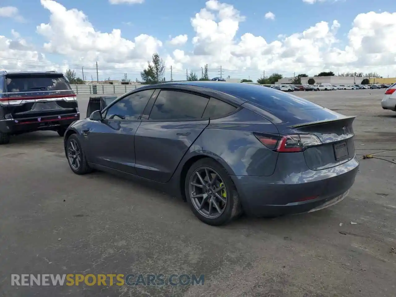 2 Photograph of a damaged car 5YJ3E1EA3NF243395 TESLA MODEL 3 2022