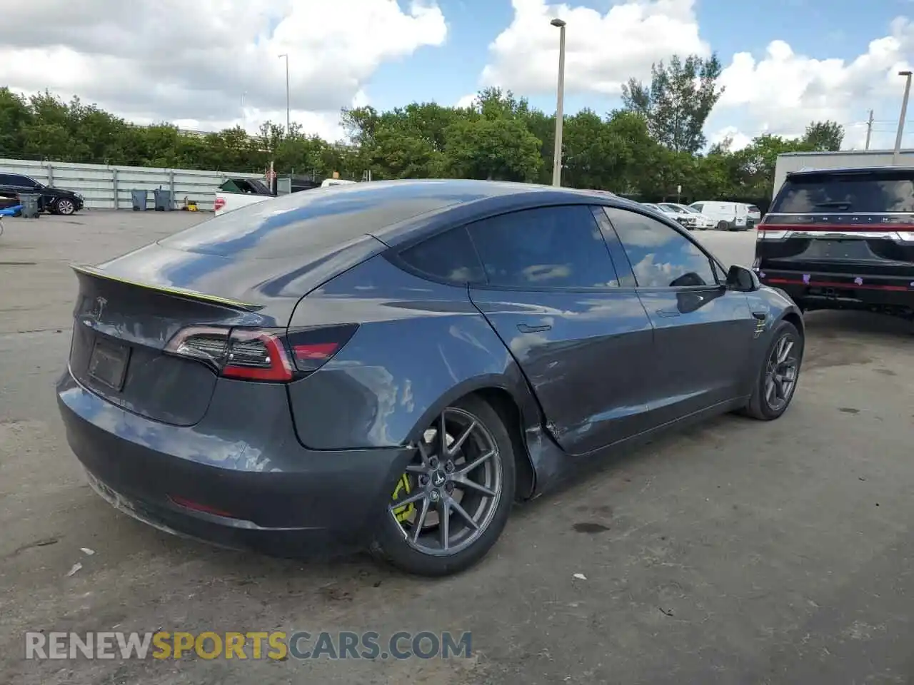 3 Photograph of a damaged car 5YJ3E1EA3NF243395 TESLA MODEL 3 2022